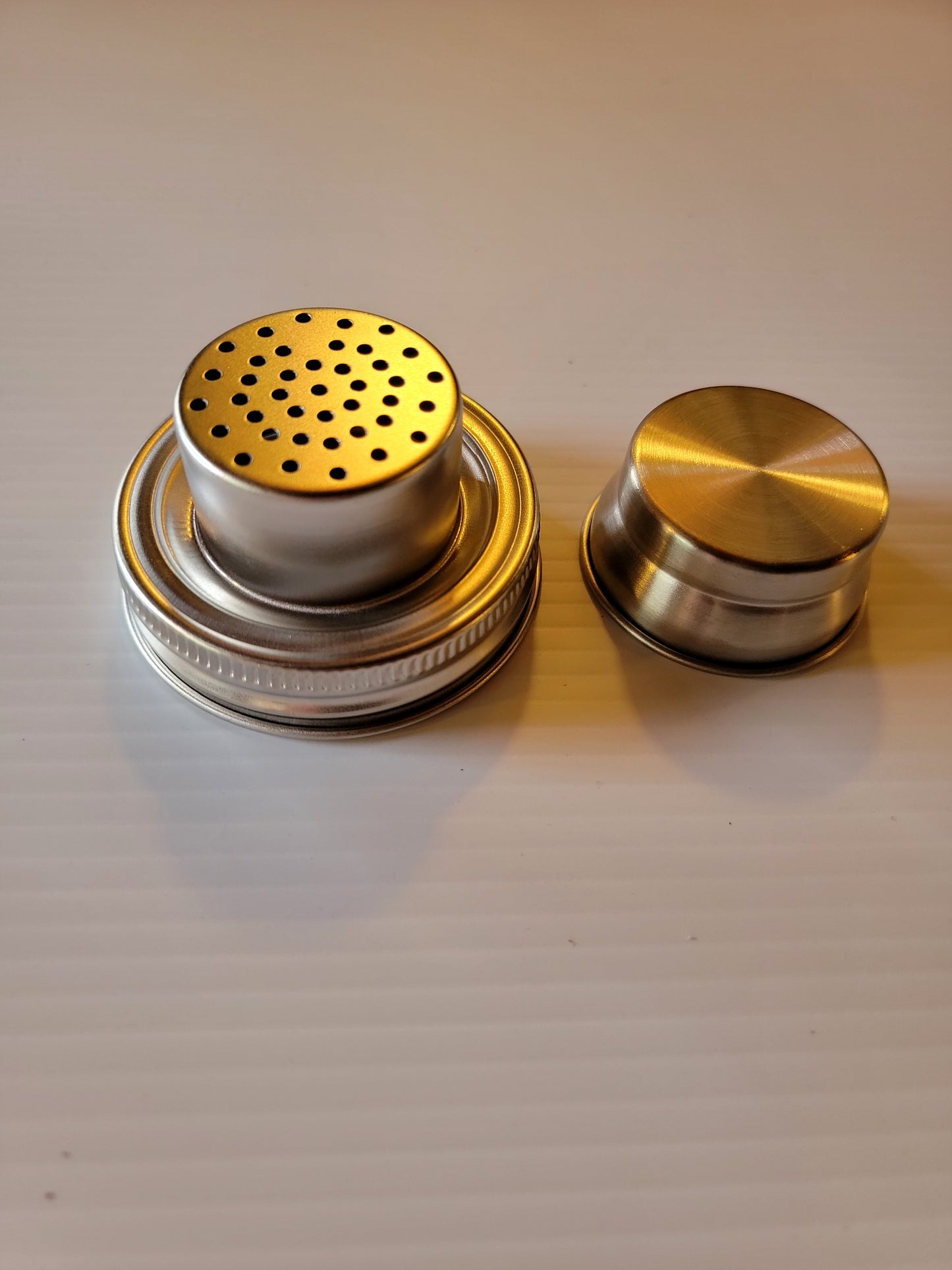 Odor release lid for regular mouth jars.